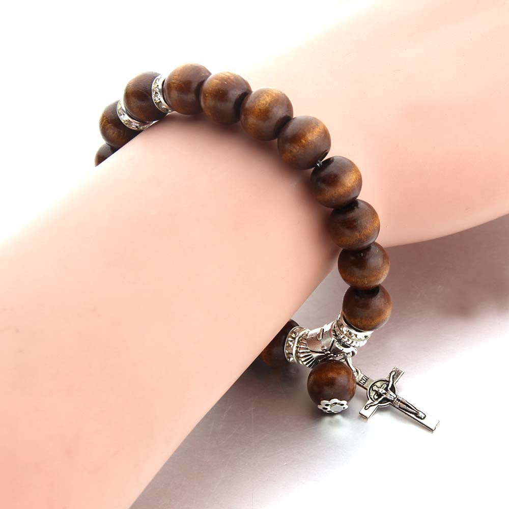 Bracelet croix Jésus en perles de bois fait main par Christianartworkshop - image 1