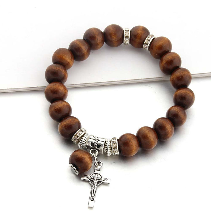 Bracelet croix Jésus en perles de bois fait main par Christianartworkshop - Café - image 0