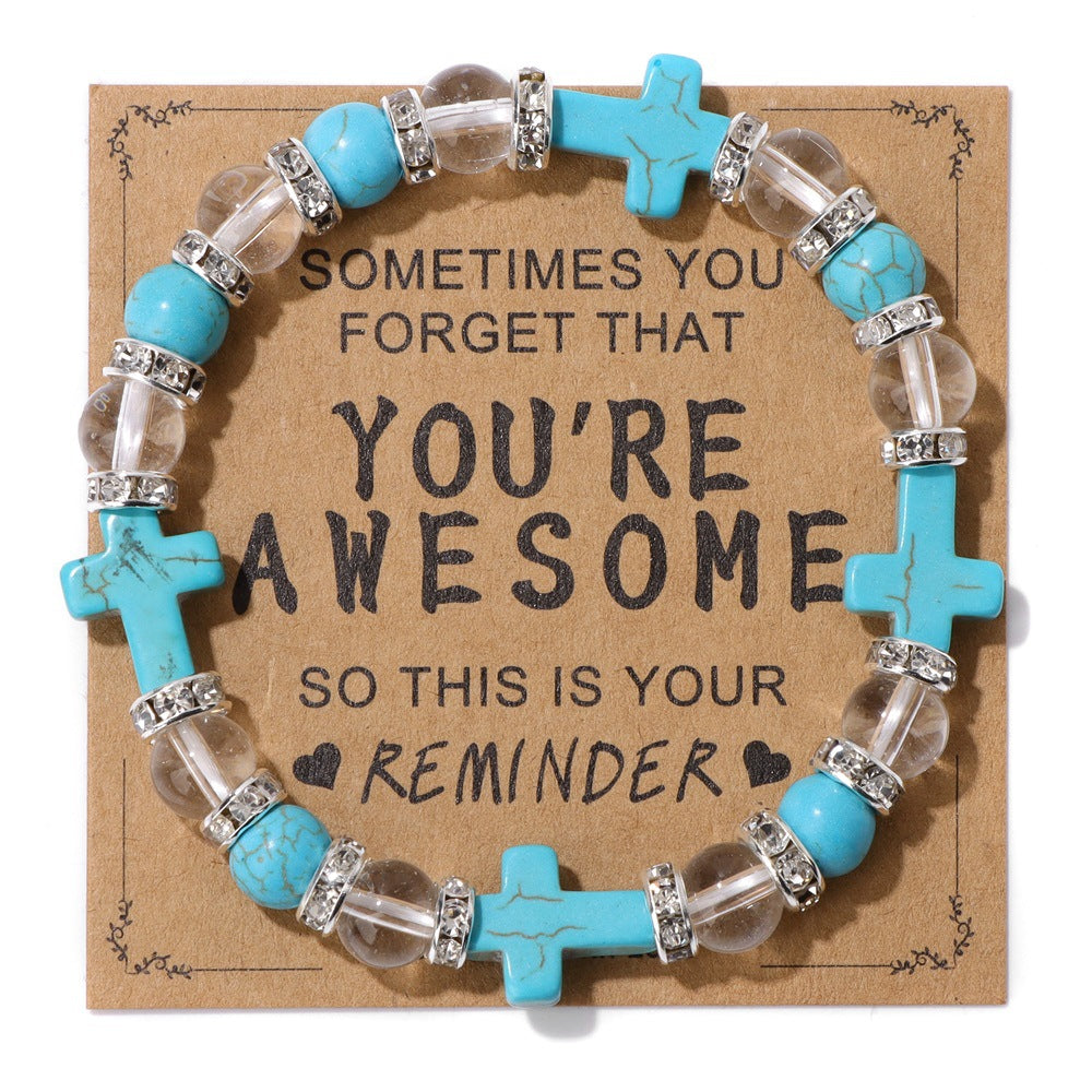 Bracelet refuge en perles transparentes avec croix turquoise de Christianartworkshop - Bracelet turquoise en forme de croix - image 0