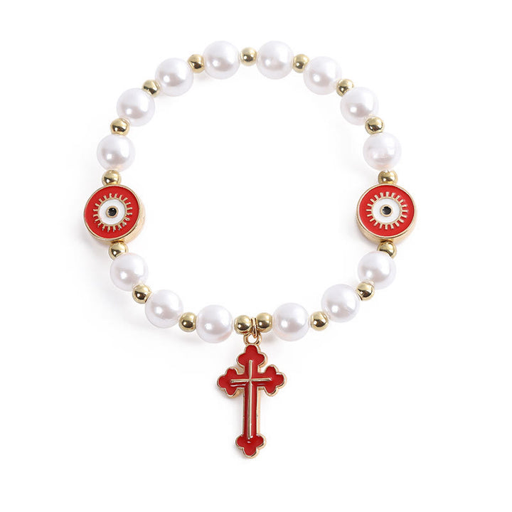 Bracelet en perles « Yeux » fait main avec croix perlée - image 1