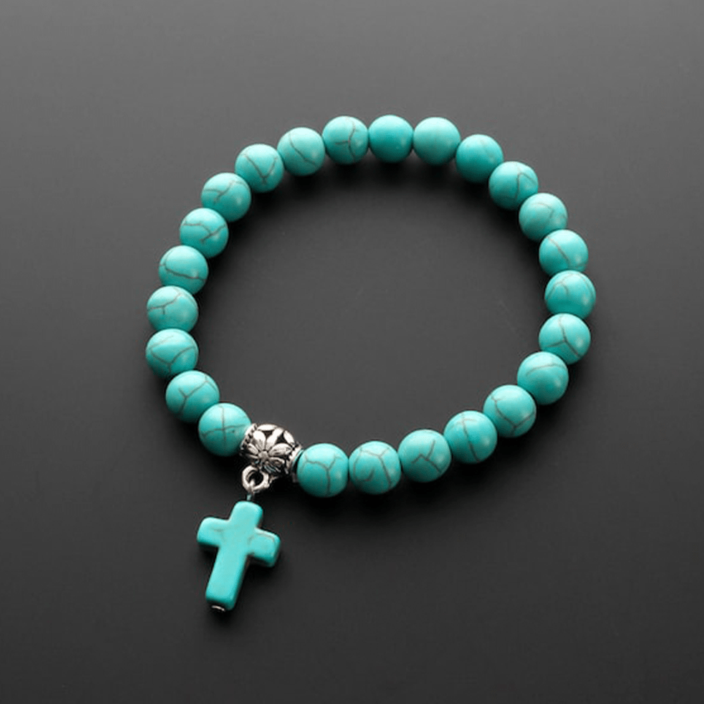 Bracelet crucifix en perles turquoise mates givrées Christianartworkshop - image 1