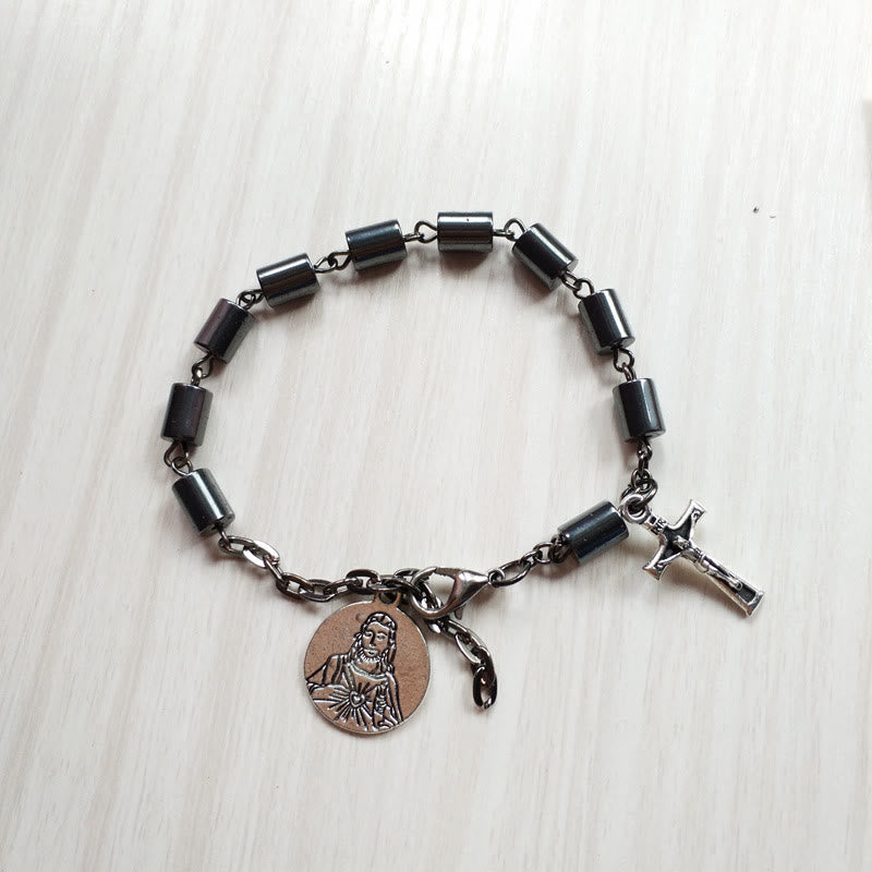 Bracelet en hématite représentant le Sacré-Cœur et le Crucifix de Jésus, signé Christianartworkshop, dans un esprit de simplicité. - Noir - image 0