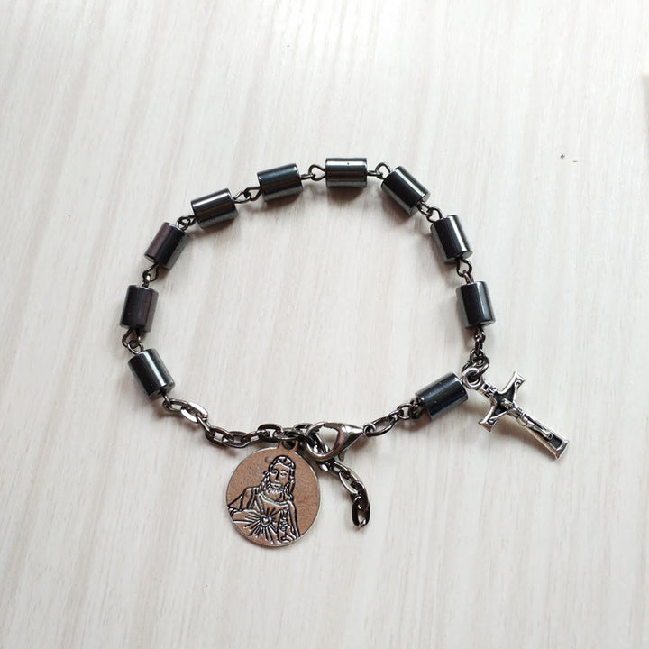Bracelet en hématite représentant le Sacré-Cœur et le Crucifix de Jésus, signé Christianartworkshop, dans un esprit de simplicité. - Noir - image 0