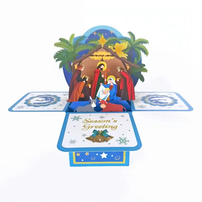 Carte de vœux 3D en papier représentant la Nativité de Jésus, avec un message de bénédiction. - image 1