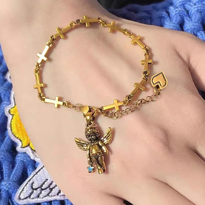 Bracelet Christianartworkshop style rétro en bronze avec étoile porte-bonheur, ange et croix en forme de cœur - Ange des étoiles - image 0