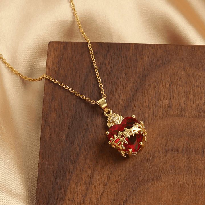 Christianartworkshop LA FOI COMME ARMURE : Collier pendentif Cœur Sacré de Jésus en pierres précieuses rouges - image 1