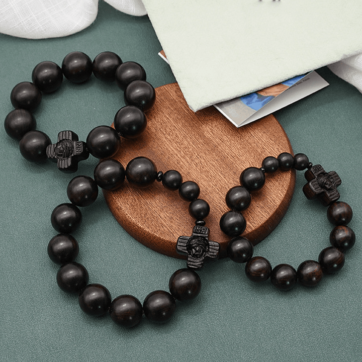 Bracelet chapelet classique en bois de santal noir avec croix de Jésus-Christ, signé Christianartworkshop - image 1
