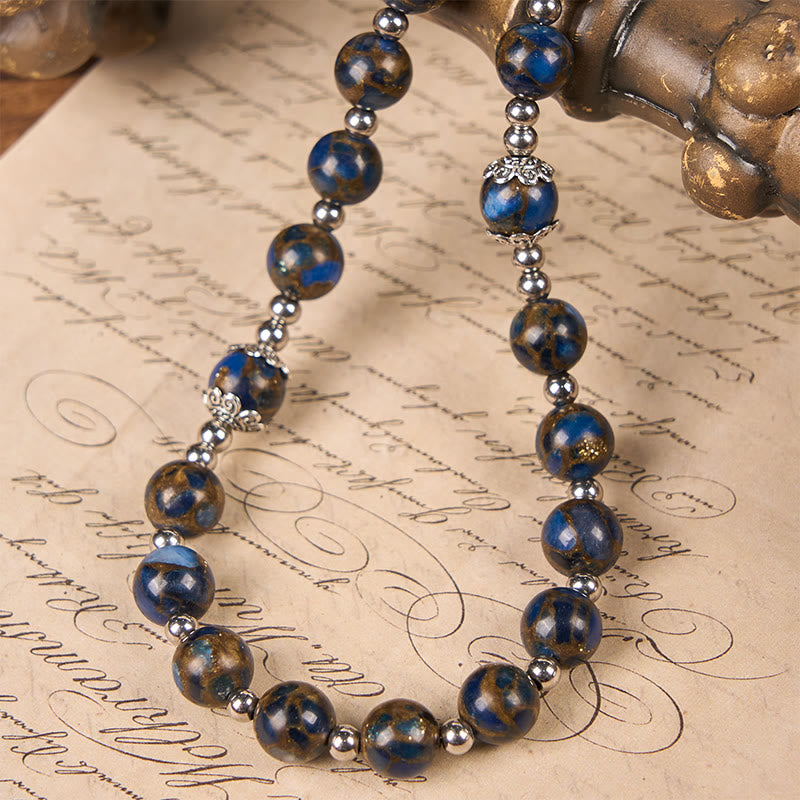 Christianartworkshop Chapelet de perles en pierre bleue et dorée de 8 mm, orné d'une croix bleue et d'un crucifix, représentant la Vierge Marie - image 5