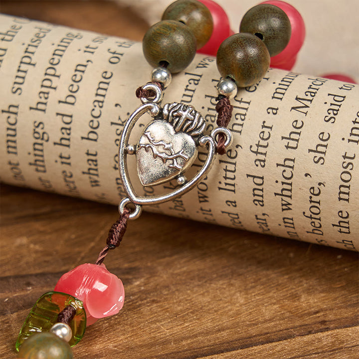 Christianartworkshop Chapelet floral fait main avec perles de santal vert et perles de rocaille rose pêche – Un hommage floral au Sacré-Cœur - image 4