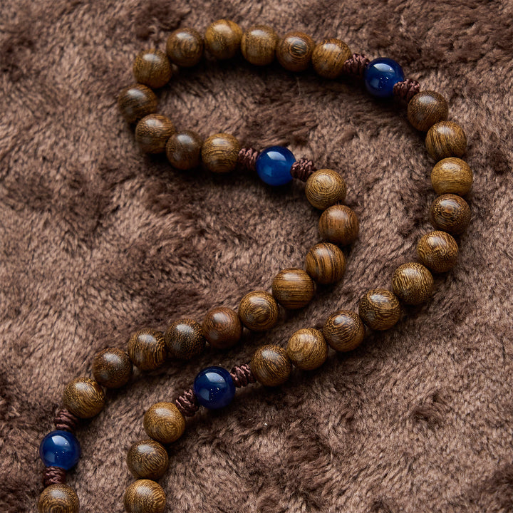 Christianartworkshop Chapelet artisanal en bois de santal doré avec Notre-Dame de Guadalupe : Un compagnon fidèle - image 5