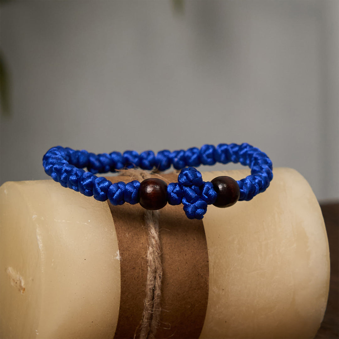 Bracelet en cordelette à nœud croix bleue et noire de Christianartworkshop : un gage de foi - image 10