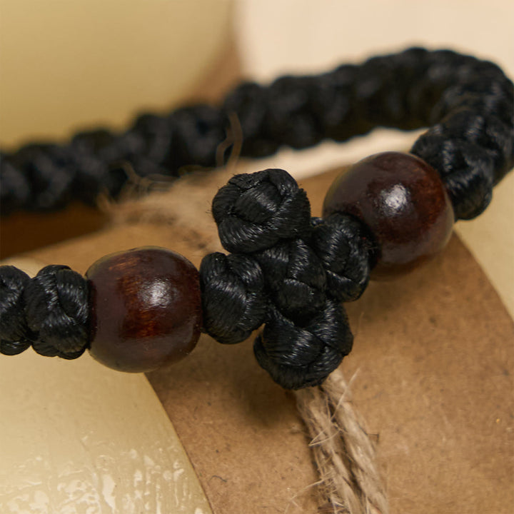 Bracelet en cordelette à nœud croix bleue et noire de Christianartworkshop : un gage de foi - image 8
