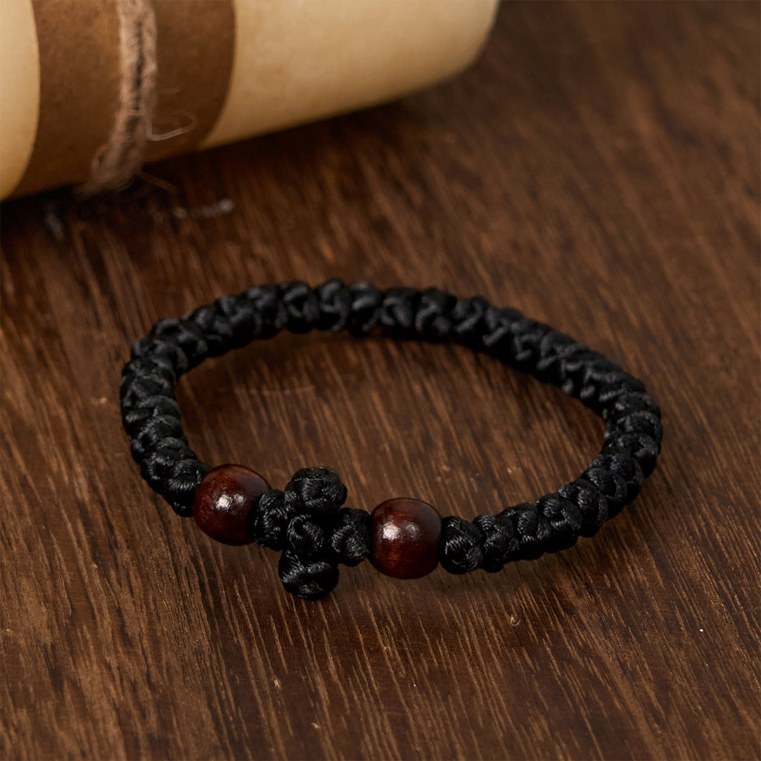 Bracelet en cordelette à nœud croix bleue et noire de Christianartworkshop : un gage de foi - image 13
