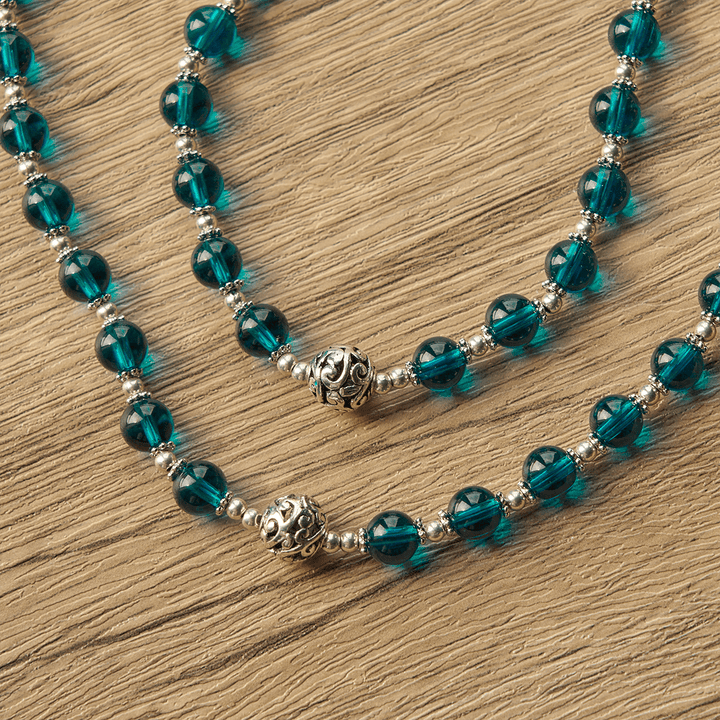Chapelet crucifix fait main en verre bleu clair avec médaille miraculeuse et croix émaillée de saint Benoît, fabriquée par Christianartworkshop. - image 9