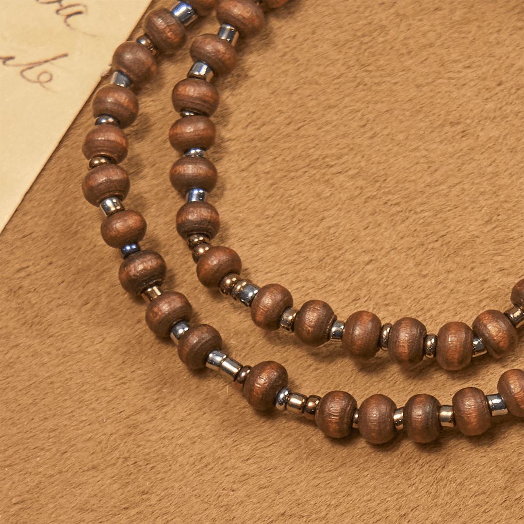 Bracelet classique en perles de bois avec croix, signé Christianartworkshop : emblème intemporel d’une foi discrète - image 6