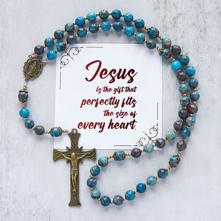 Christianartworkshop Jésus est le don : Chapelet fait main en perles à motif bleu et en pierre de larimar authentique - Jésus est le don - image 0
