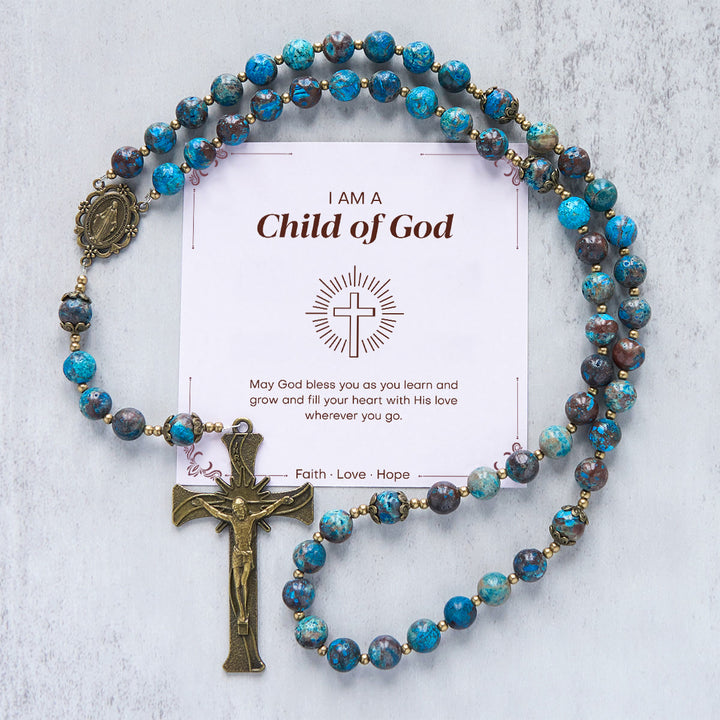 Christianartworkshop Jésus est le don : Chapelet fait main en perles à motif bleu et en pierre de larimar authentique - Enfant de Dieu - image 1