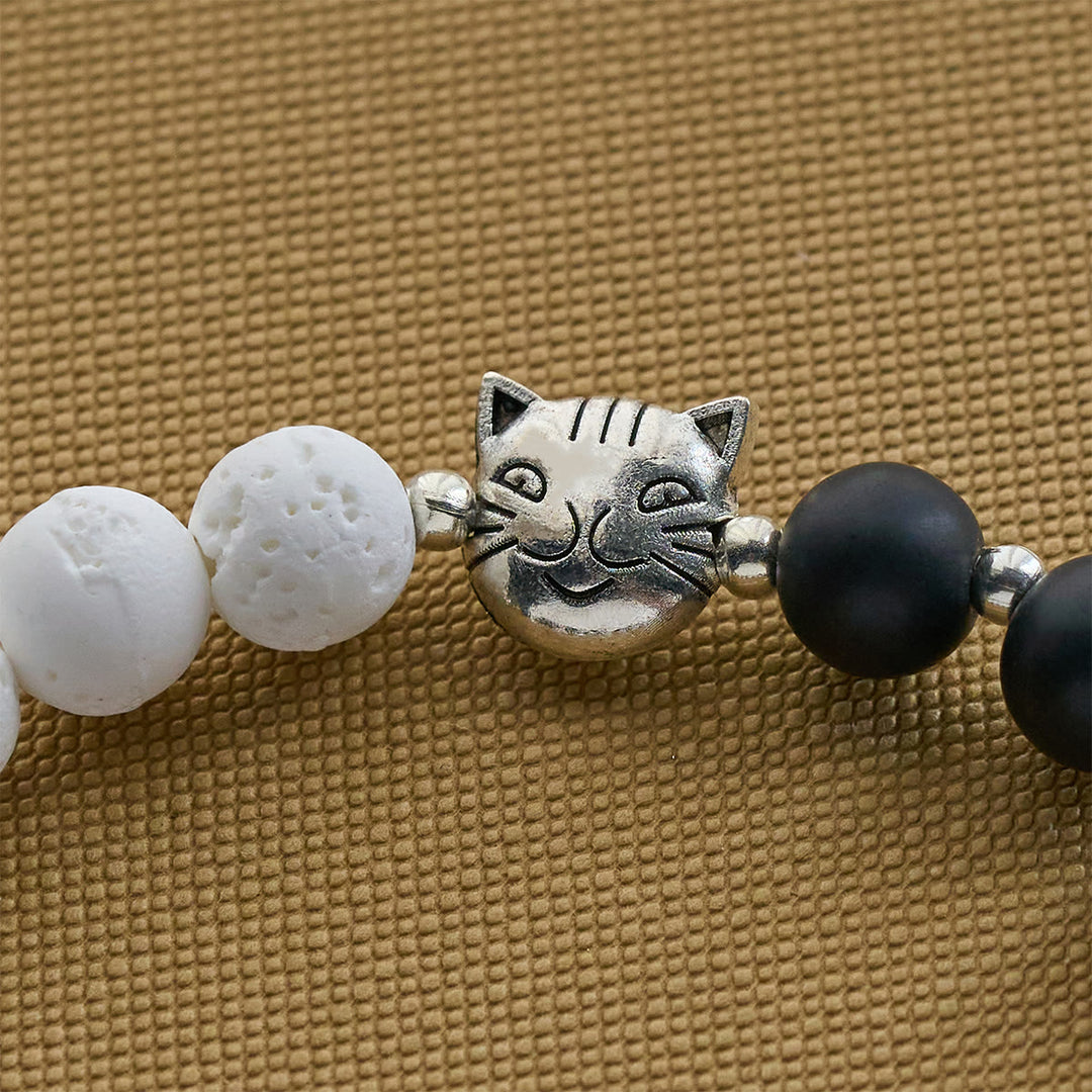 Christianartworkshop Bracelet et chapelet animalier en pierre de lave noire et blanche mate avec pendentifs chat et vache - image 14