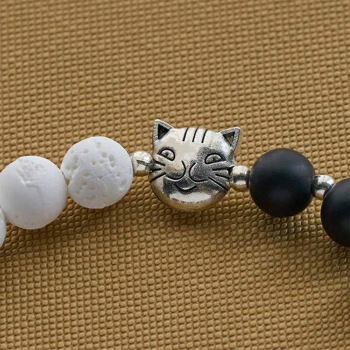 Christianartworkshop Bracelet et chapelet animalier en pierre de lave noire et blanche mate avec pendentifs chat et vache - image 14