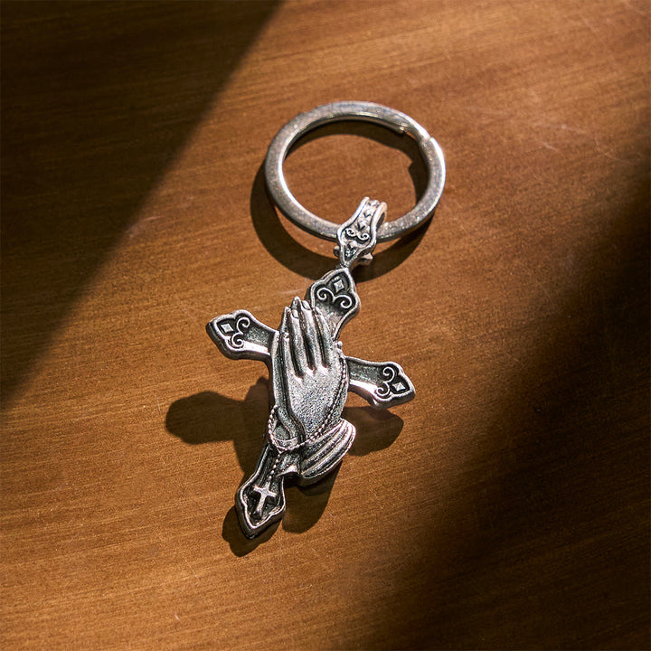 Christianartworkshop La foi à chaque pas. Porte-clés croix mains jointes en prière dans votre poche. - image 1
