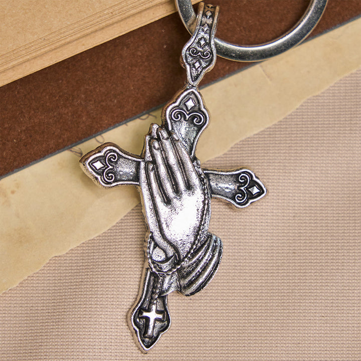 Christianartworkshop La foi à chaque pas. Porte-clés croix mains jointes en prière dans votre poche. - image 3