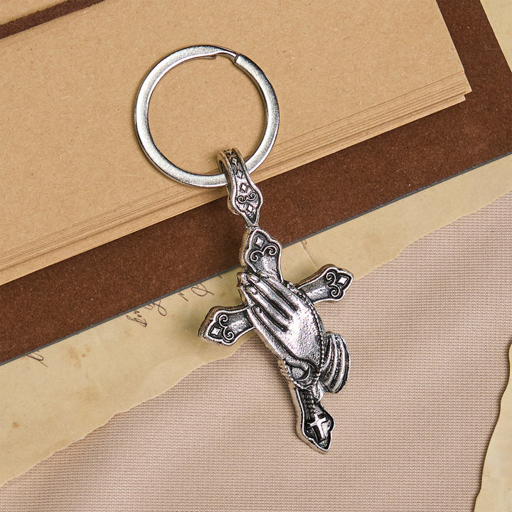 Christianartworkshop La foi à chaque pas. Porte-clés croix mains jointes en prière dans votre poche. - image 2