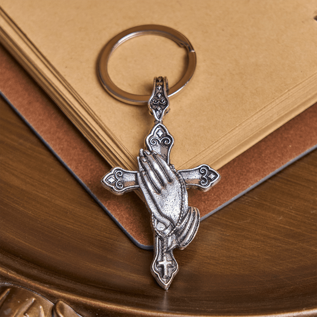 Christianartworkshop La foi à chaque pas. Porte-clés croix mains jointes en prière dans votre poche. - Mains en prière - image 0