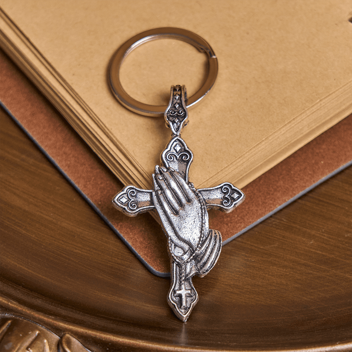 Christianartworkshop La foi à chaque pas. Porte-clés croix mains jointes en prière dans votre poche. - Mains en prière - image 0