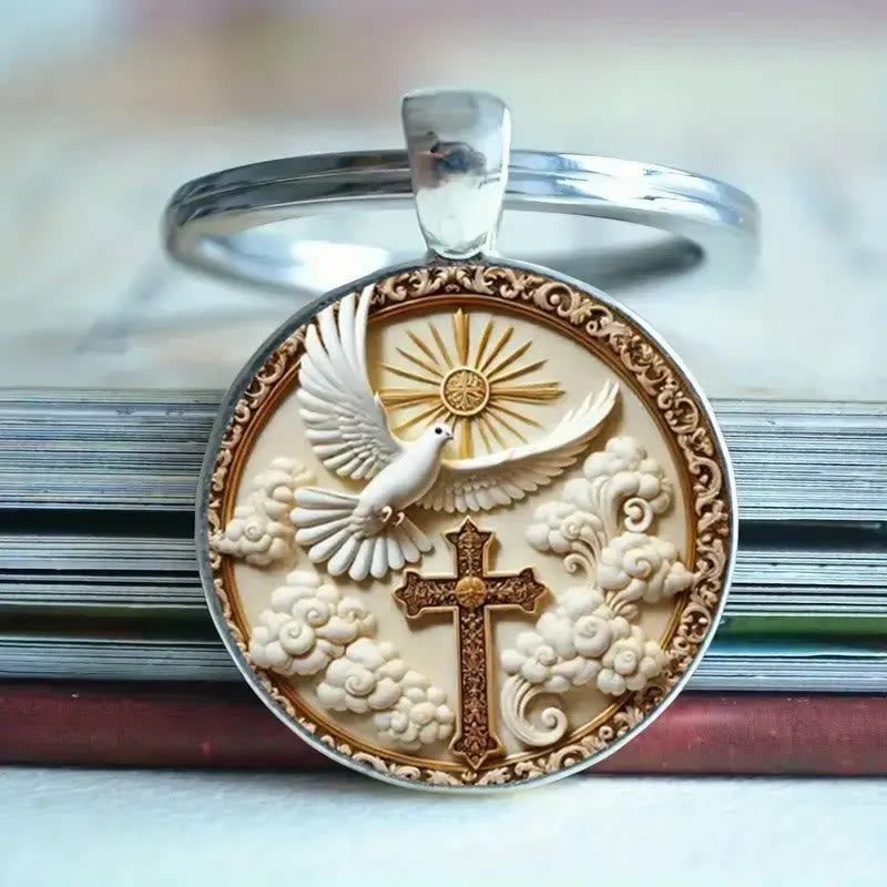 Christianartworkshop Porte-clés minimaliste argenté en forme de croix et de colombe : un subtil rappel de l'amour divin - image 1