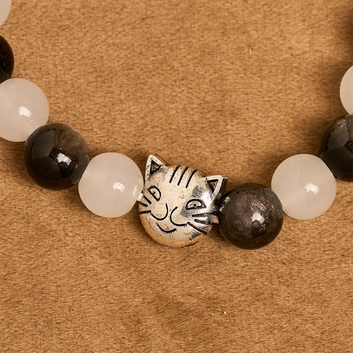 Christianartworkshop Bracelet animalier avec perles représentant une vache et un chat noirs et blancs, symbole de la bénédiction de Notre-Dame - image 7