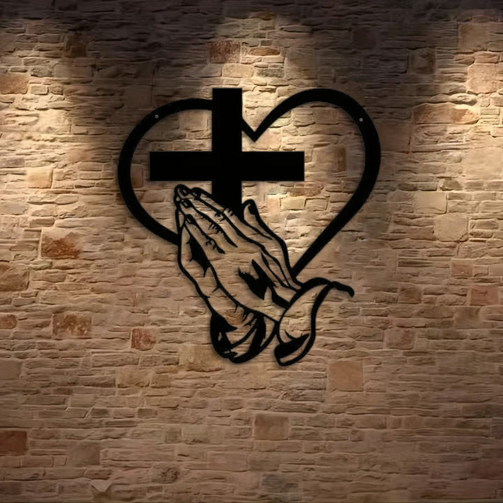 Christianartworkshop Décoration murale moderne et spirituelle en métal noir représentant des mains en prière, un cœur et une croix. - image 2