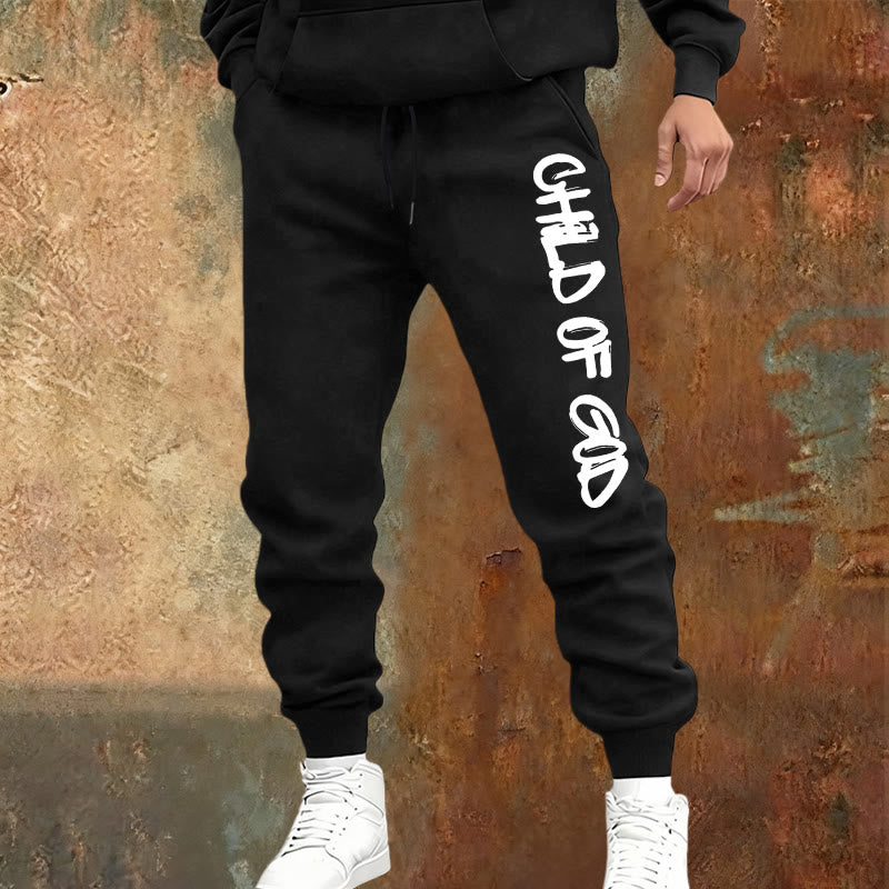Atelier d'art chrétien - Pantalon de survêtement avec citation « Enfant de Dieu » inspirée par la foi et en caractères gras - image 1