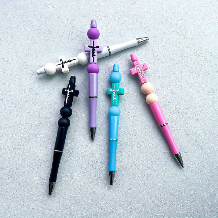 Christianartworkshop Stylo Croix de Jésus : Un instrument d'écriture inspiré par la foi et empreint de charme symbolique - image 3