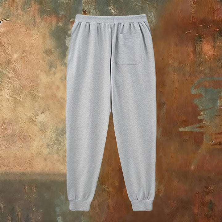 Atelier d'art chrétien - Croix et pantalon de survêtement « Jésus sauve » : un vêtement du quotidien lié à sa promesse - image 11