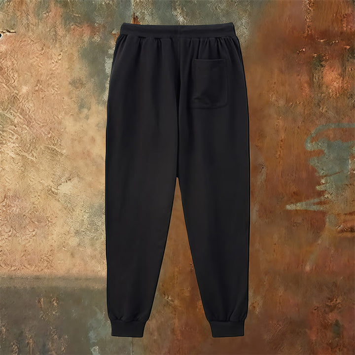 Atelier d'art chrétien - Croix et pantalon de survêtement « Jésus sauve » : un vêtement du quotidien lié à sa promesse - image 23