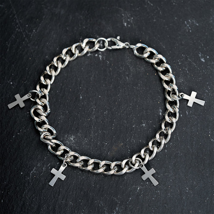 Bracelet à maillons gourmette Christianartworkshop avec breloques croix pendantes : Incarnez sa grâce audacieuse - image 4