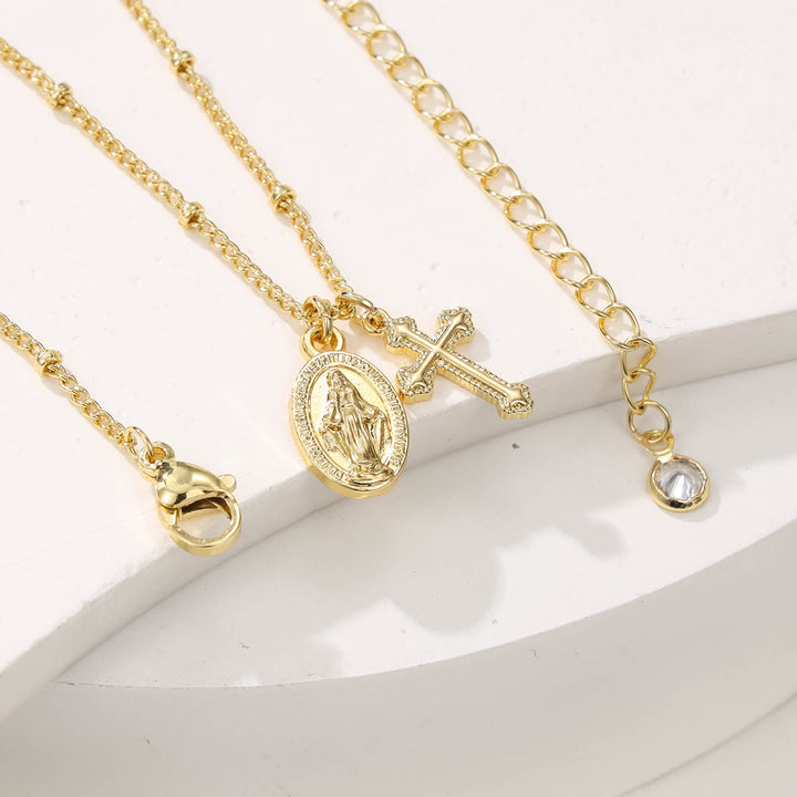Christianartworkshop Collier doré à double pendentif Croix et Notre-Dame : Incarnez Sa grâce et Sa tendresse maternelle - image 1