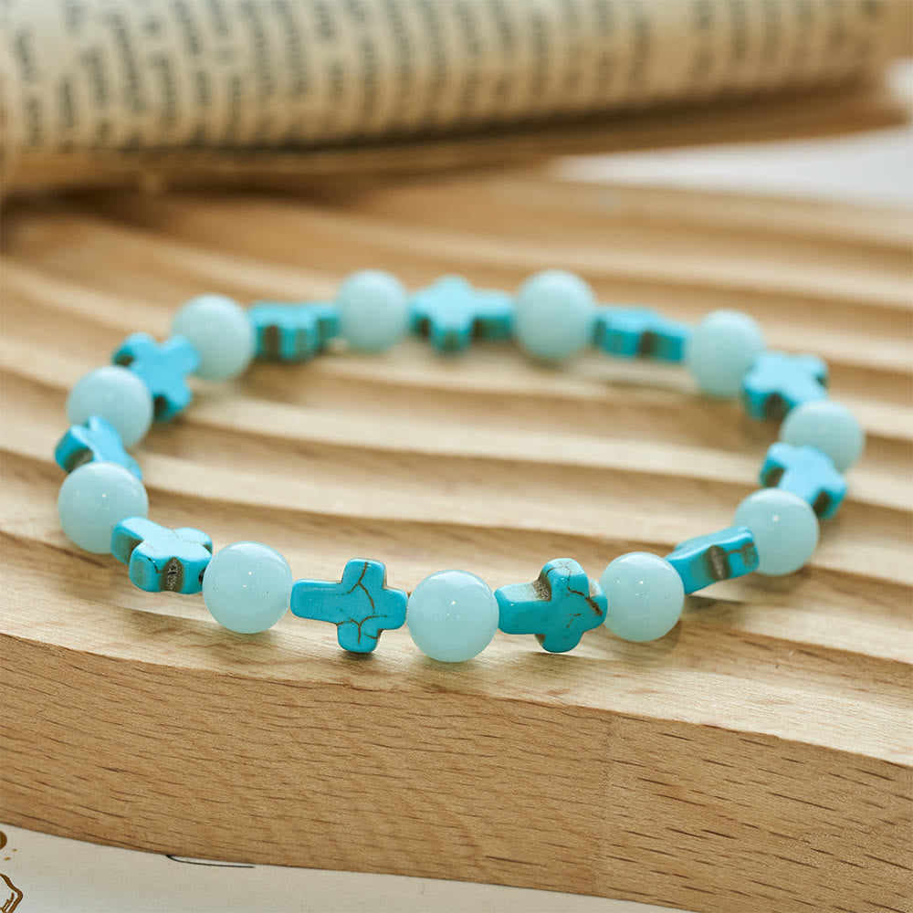 Bracelet croix turquoise et perles lumineuses de Christianartworkshop - Bracelet lumineux - image 0