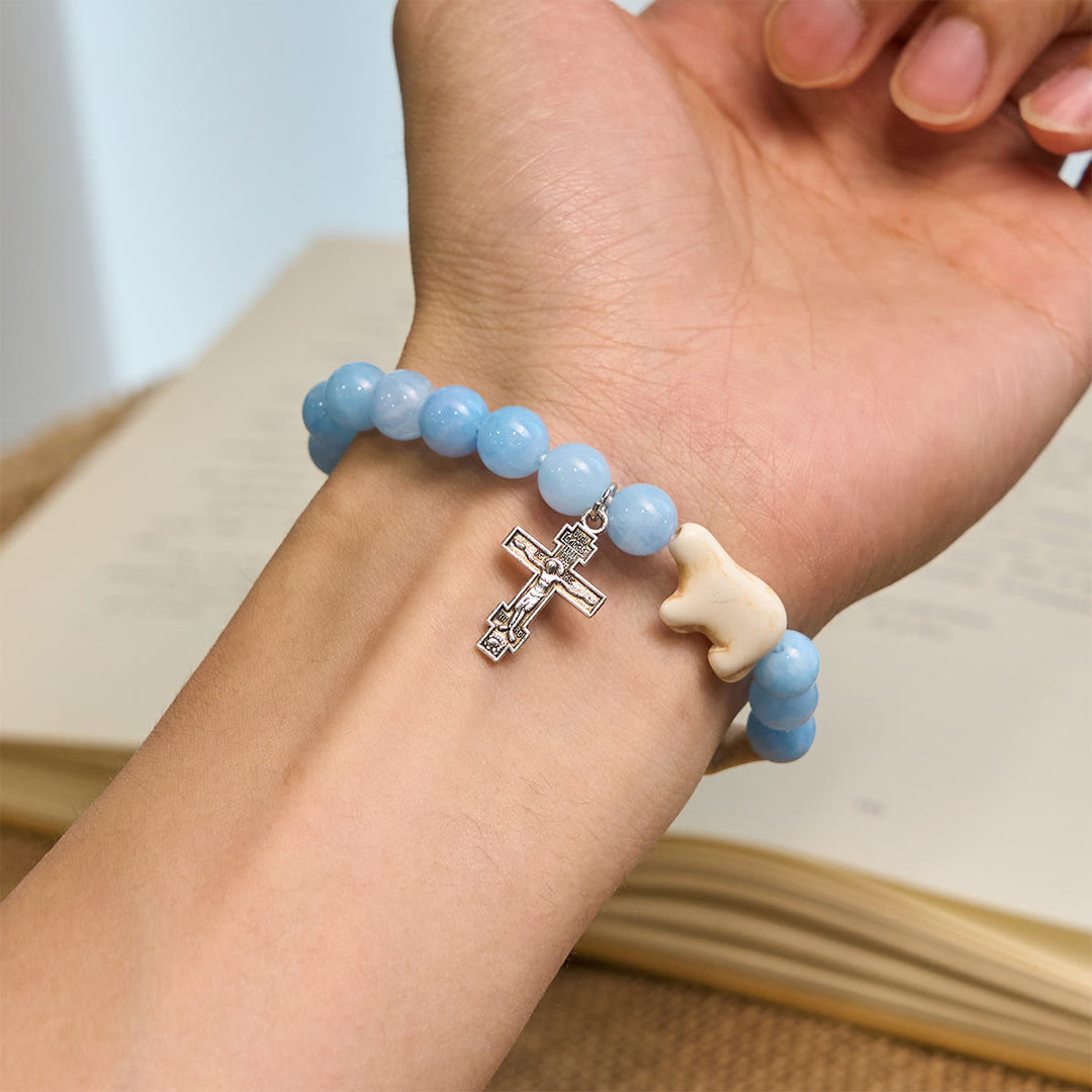 Christianartworkshop Bracelet croix fait main avec perles bleues et ours polaire : Sauvons nos ours polaires - image 1