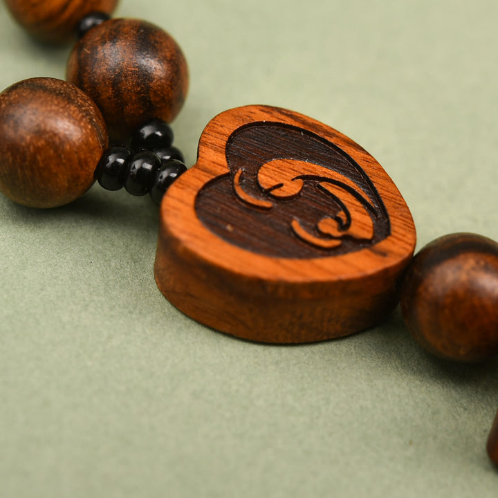 Christianartworkshop Pendentif chapelet en bois en forme de crucifix à deux motifs : un symbole de protection pour les voyageurs - image 3