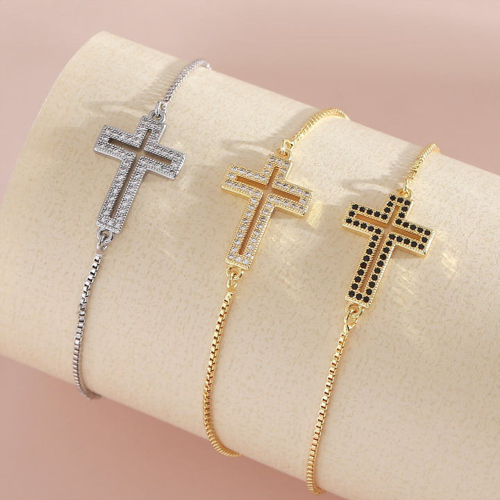 Christianartworkshop Bracelet croix en zircon doré/argenté/noir : Incarnez la grâce de la croix - image 0