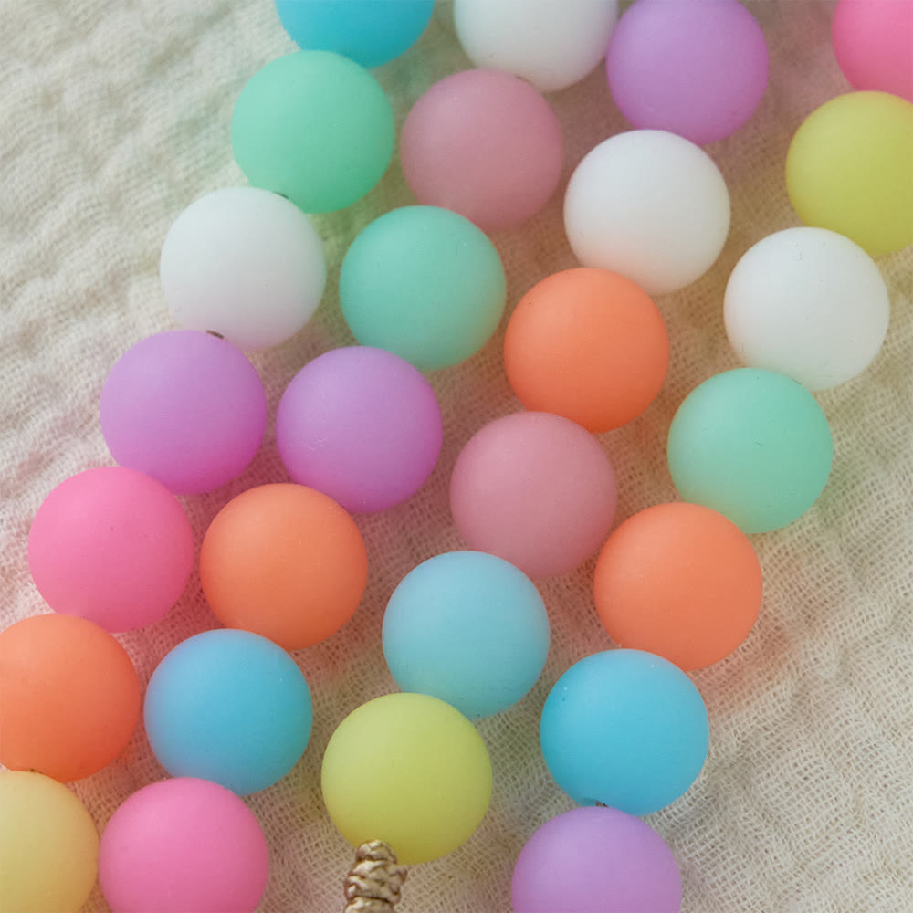 Christianartworkshop Chapelet en perles de silicone pastel orné d'icônes de Jésus dessinées : un symbole de foi enfantine et de joie divine - image 4