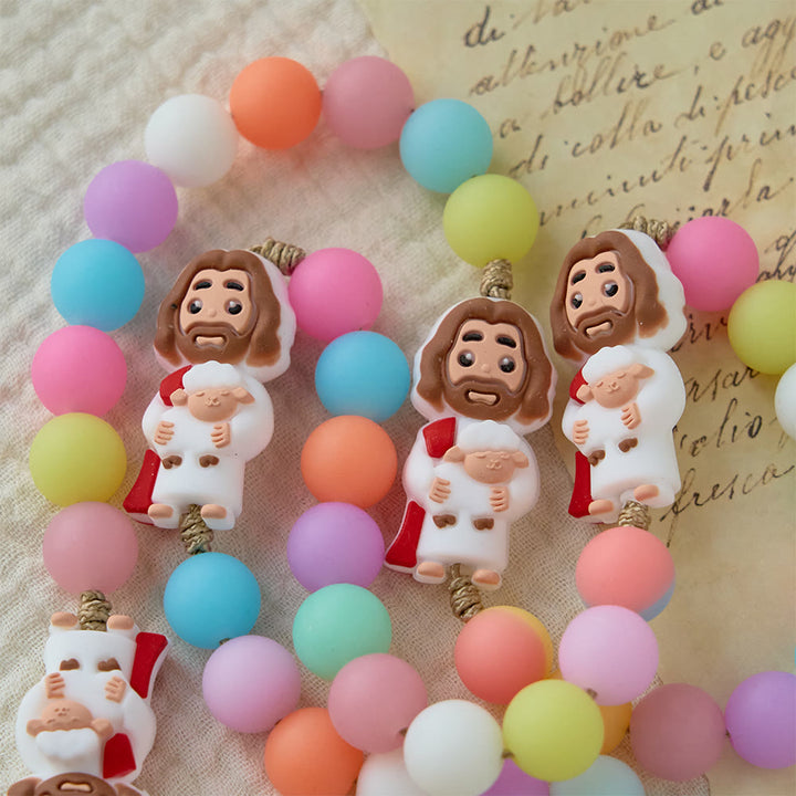 Christianartworkshop Chapelet en perles de silicone pastel orné d'icônes de Jésus dessinées : un symbole de foi enfantine et de joie divine - image 3