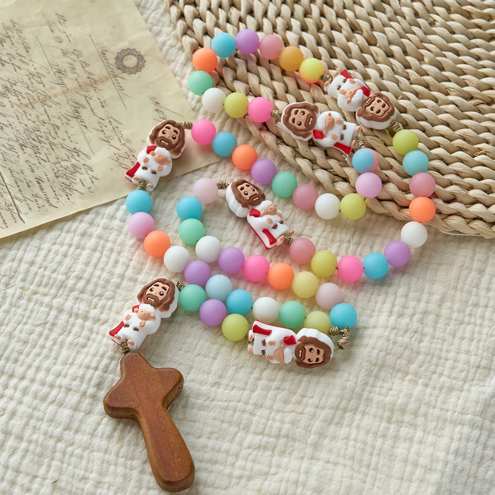 Christianartworkshop Chapelet en perles de silicone pastel orné d'icônes de Jésus dessinées : un symbole de foi enfantine et de joie divine - Jésus de dessin animé accentue le chapelet - image 0