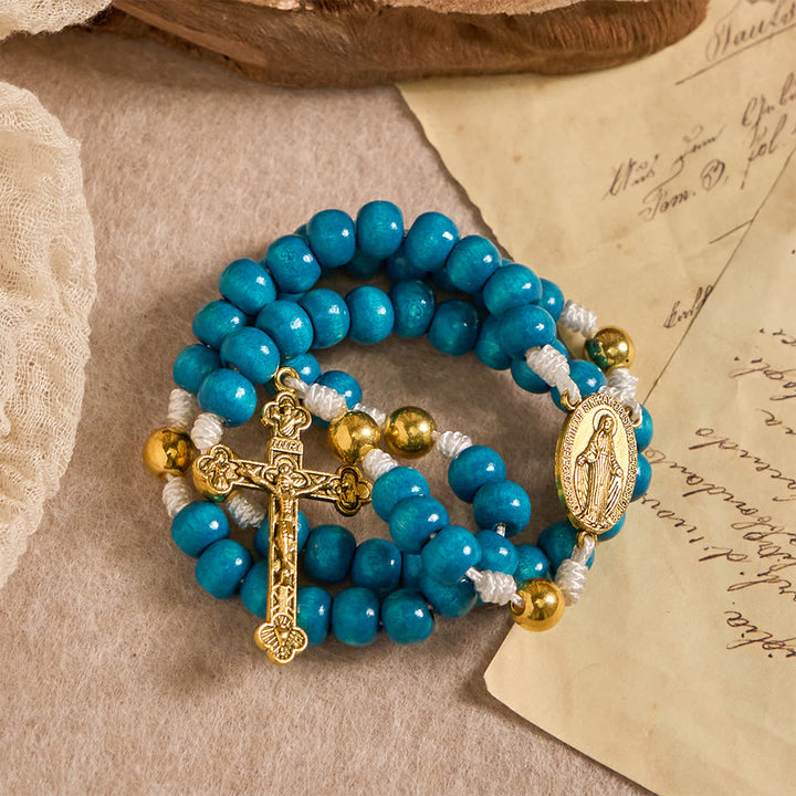 Christianartworkshop Chapelet en bois bleu avec médaillon de Notre-Dame : un symbole de grâce et de foi divine - image 4