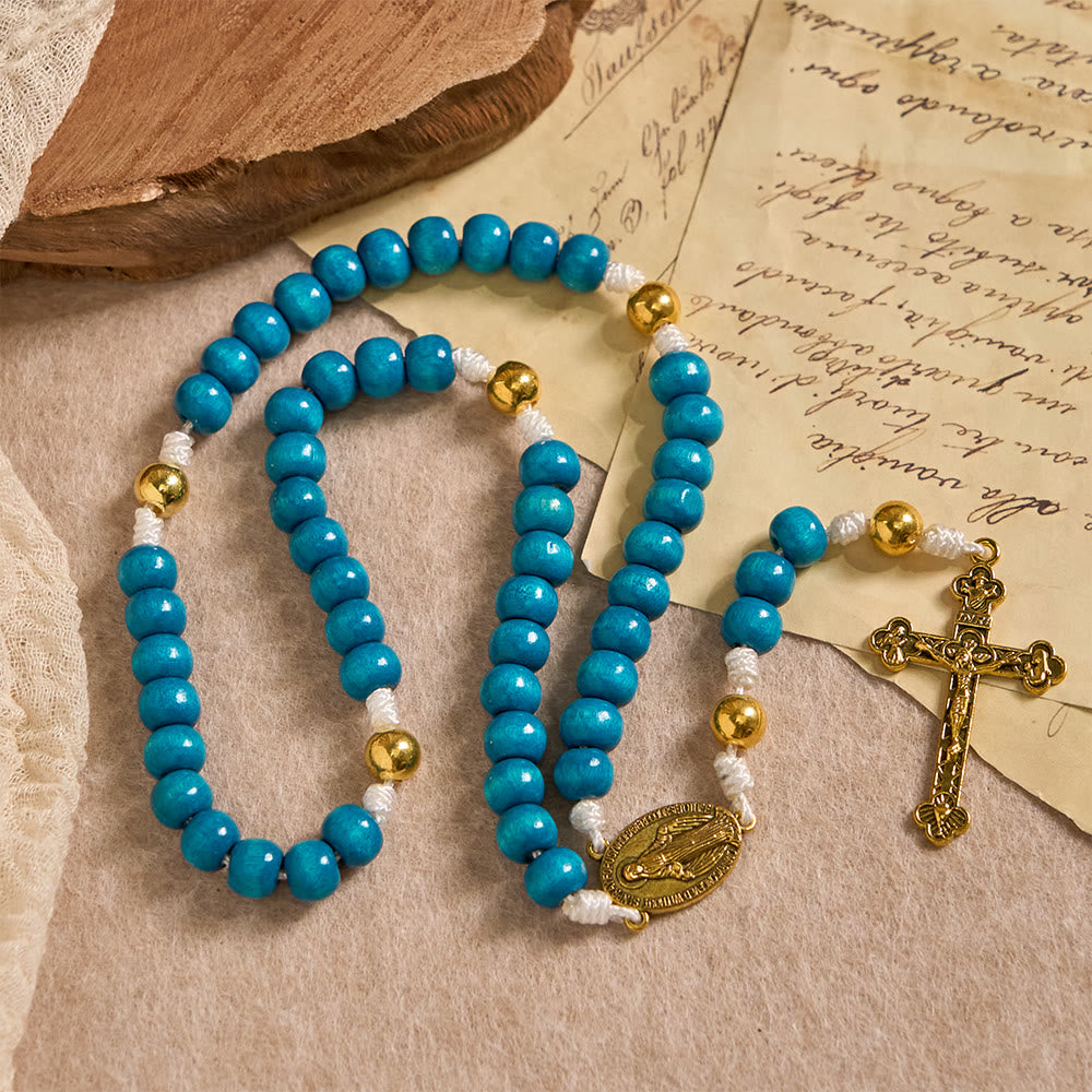 Christianartworkshop Chapelet en bois bleu avec médaillon de Notre-Dame : un symbole de grâce et de foi divine - Notre-Dame et le Crucifix - image 0