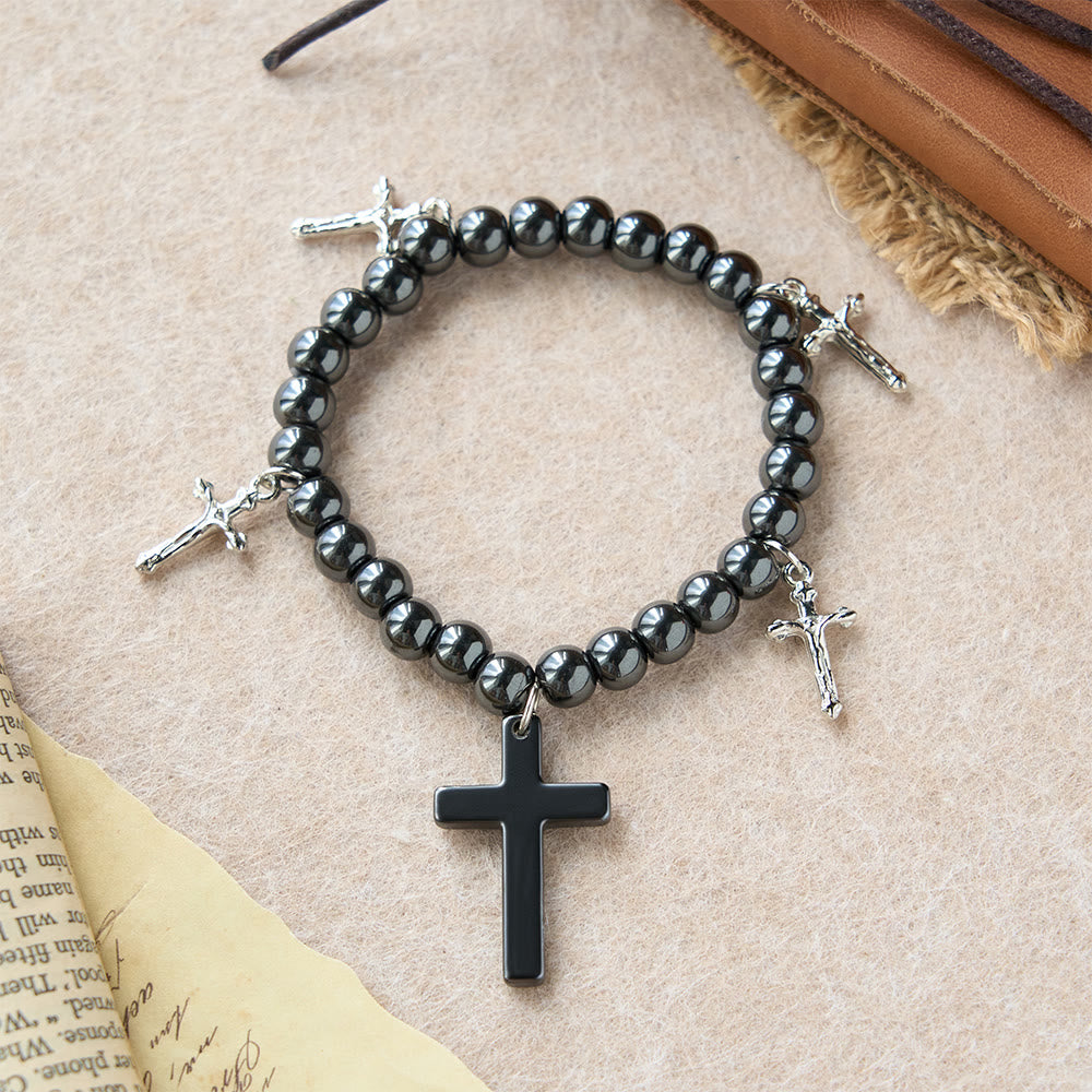 Christianartworkshop Bracelet croix en perles d'hématite avec breloques mini crucifix : symbole de protection divine et de foi - Noir - image 0