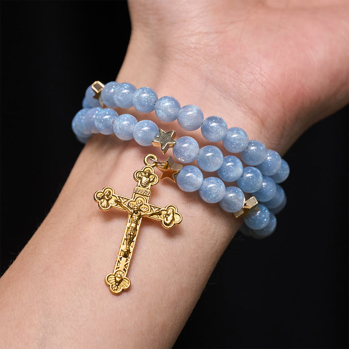 Christianartworkshop Bracelet enroulé de perles de verre bleues avec entretoises en forme d'étoile et crucifix doré - image 1