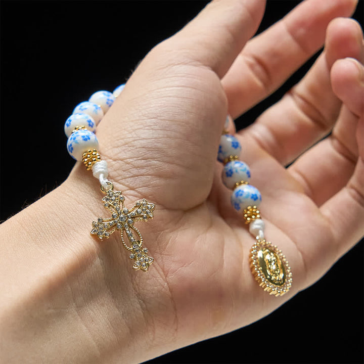 Christianartworkshop Chapelet de poche en porcelaine bleue à motif floral, orné d'une élégante Vierge Marie et d'une croix. - image 1