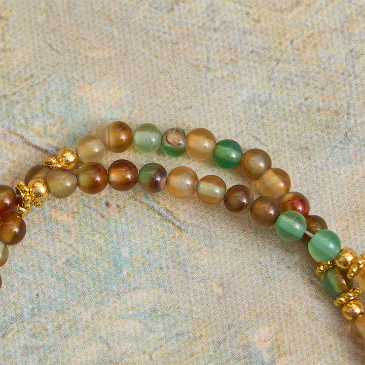 Christianartworkshop Bracelet chapelet magnétique en agate paon avec saint Benoît doré - image 11